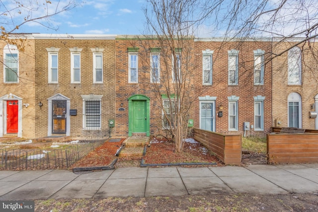 multi unit property featuring brick siding