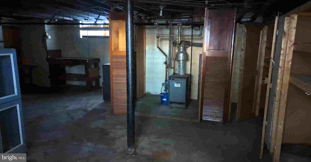 below grade area featuring a heating unit