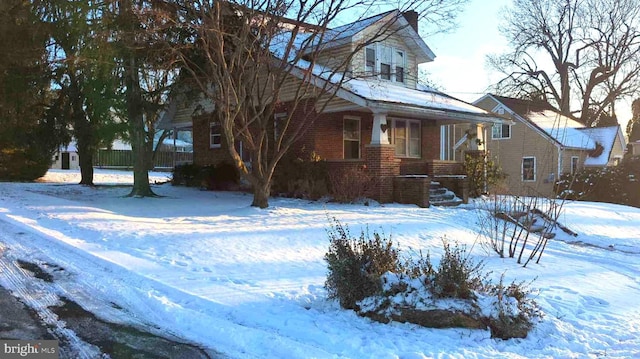 view of front facade featuring brick siding