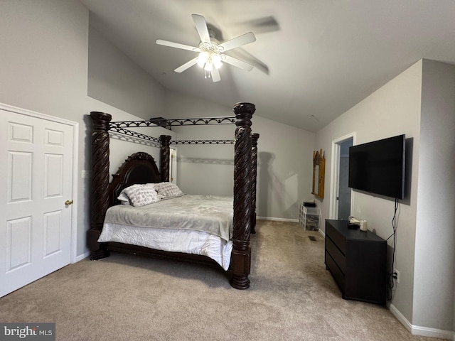 bedroom with baseboards, light colored carpet, a ceiling fan, and vaulted ceiling