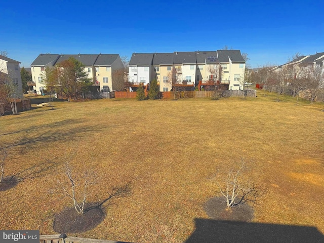 view of yard featuring a residential view