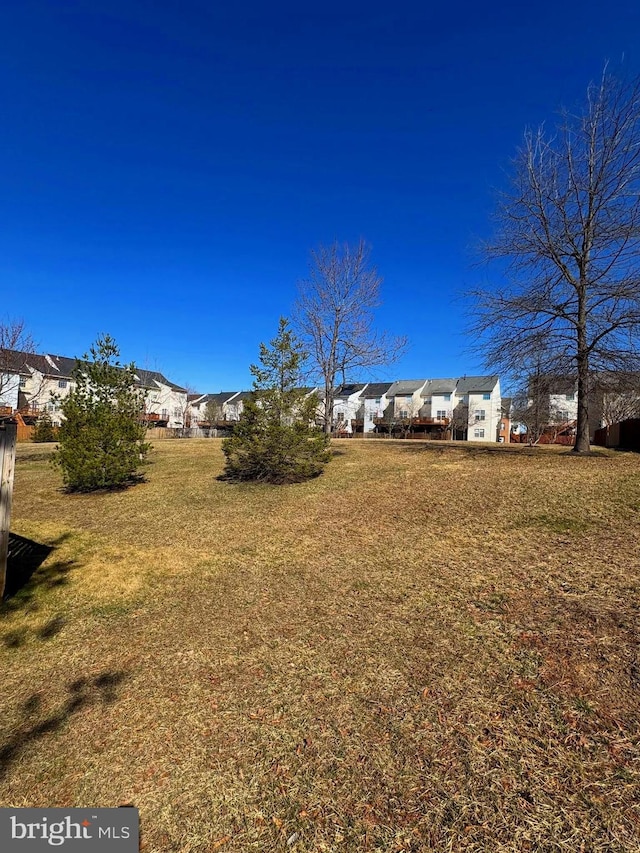 view of yard featuring a residential view