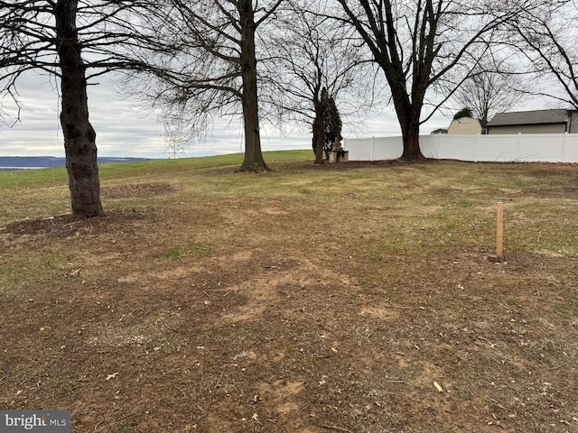 view of yard with fence