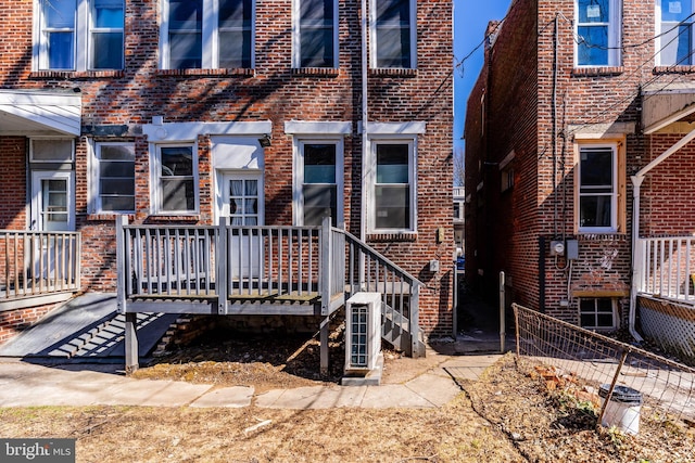 back of property with brick siding