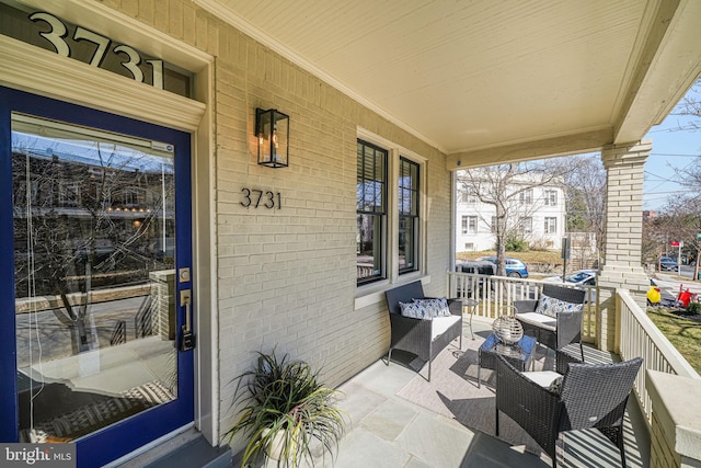 view of patio / terrace with a porch