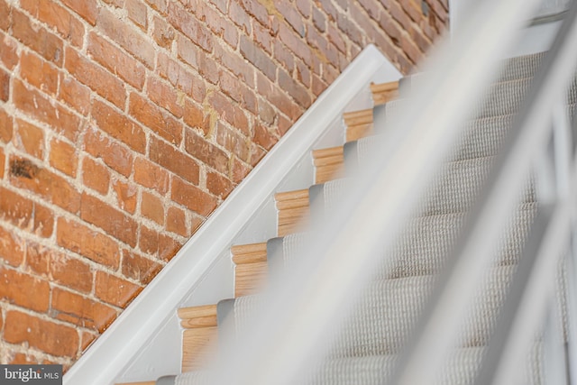 stairs with brick wall