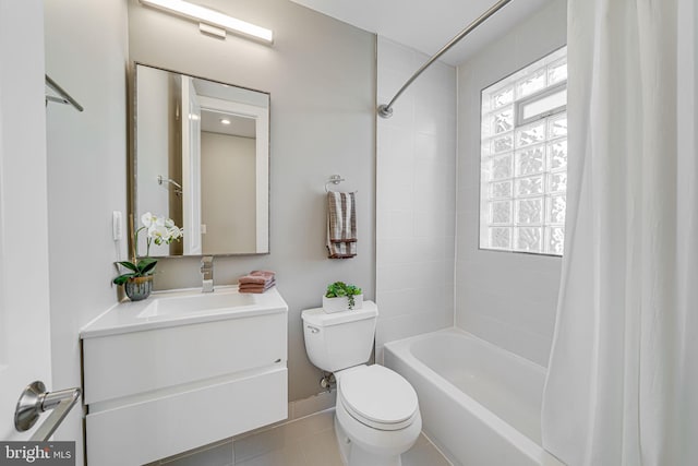 bathroom with vanity, shower / tub combo, toilet, and tile patterned flooring