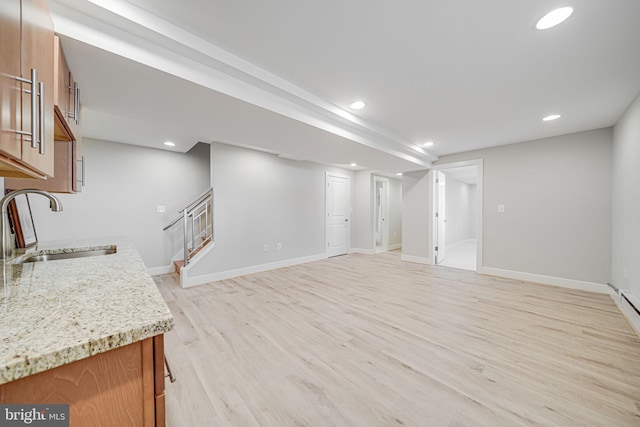 interior space featuring recessed lighting, stairway, and light wood finished floors