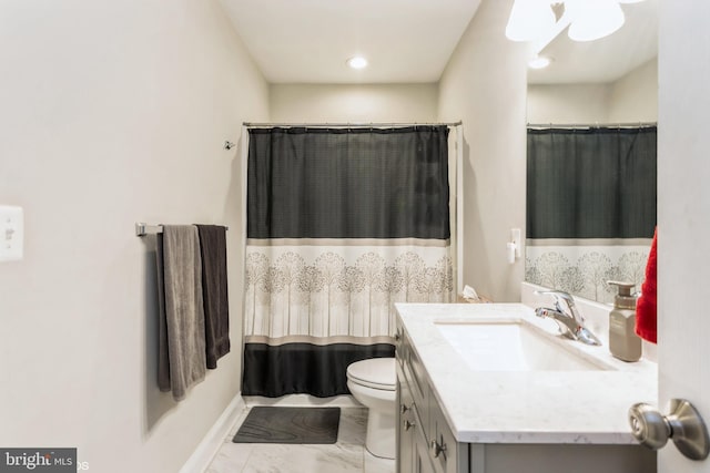 full bath featuring toilet, marble finish floor, baseboards, and vanity