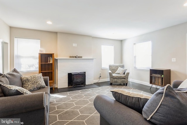 living area with recessed lighting and baseboards