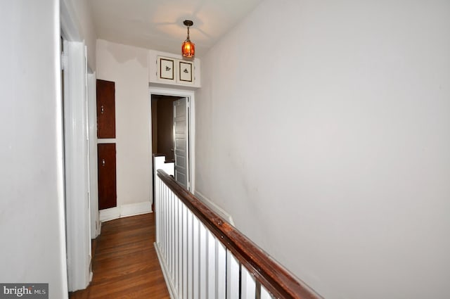 hall featuring wood finished floors