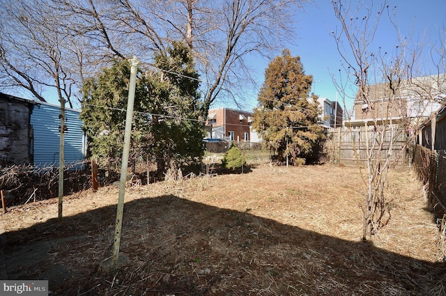 view of yard with fence