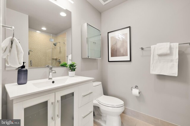 full bathroom with vanity, recessed lighting, tile patterned flooring, a shower stall, and toilet