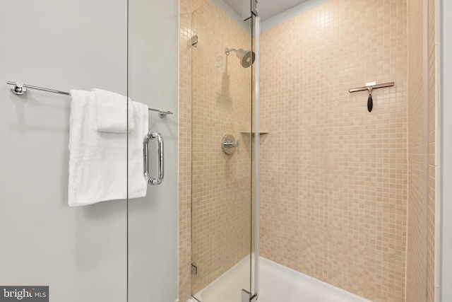 full bathroom with a shower stall