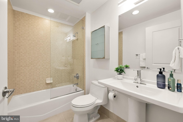 full bathroom featuring recessed lighting, shower / bath combination, toilet, and tile patterned flooring