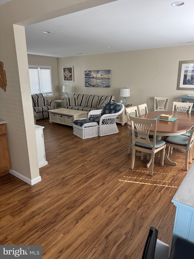 10 W Essex Ave, Harvey Cedars, NJ 08008 - dining space featuring wood finished floors and baseboards
