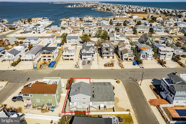 10 W Essex Ave, Harvey Cedars, NJ 08008 - aerial view of residential area with a nearby body of water and property parcel outlined
