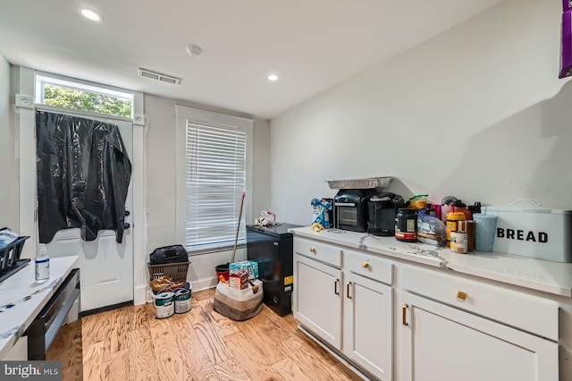 5312 Cordelia Ave, Baltimore, MD 21215 - laundry room featuring light wood-type flooring and recessed lighting