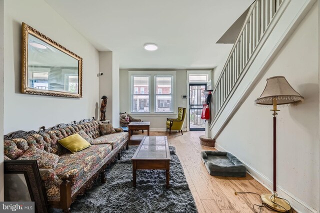 5312 Cordelia Ave, Baltimore, MD 21215 - living area with stairs and wood finished floors