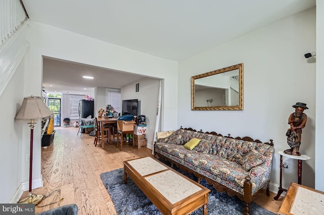 5312 Cordelia Ave, Baltimore, MD 21215 - living area featuring wood finished floors and an office area