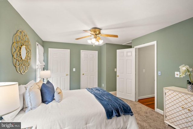 bedroom featuring baseboards and a ceiling fan