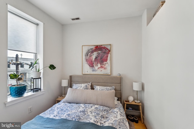 bedroom with visible vents