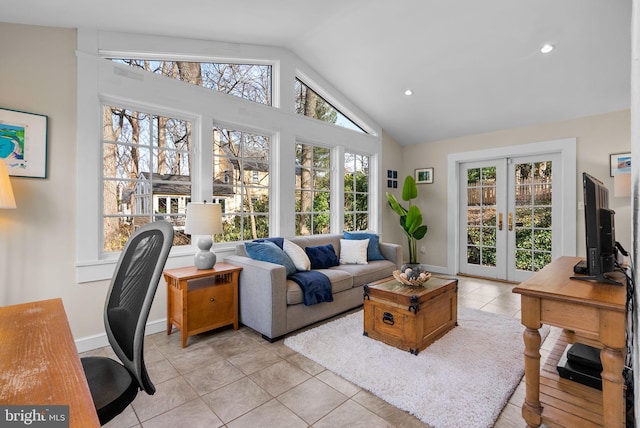 living area with recessed lighting, light tile patterned floors, french doors, and baseboards