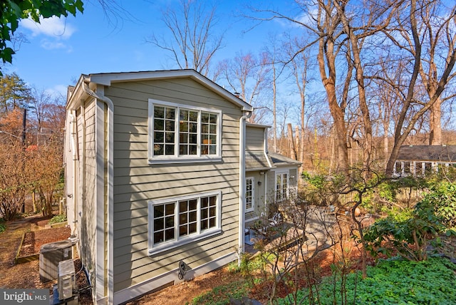 view of property exterior featuring central AC unit