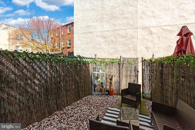 view of patio / terrace featuring fence