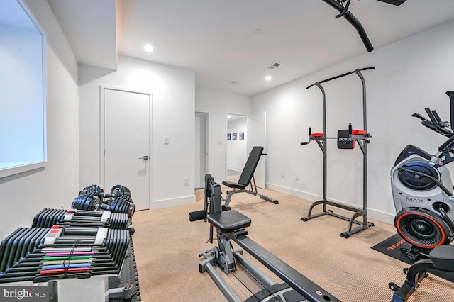 workout area featuring visible vents, recessed lighting, baseboards, and carpet floors