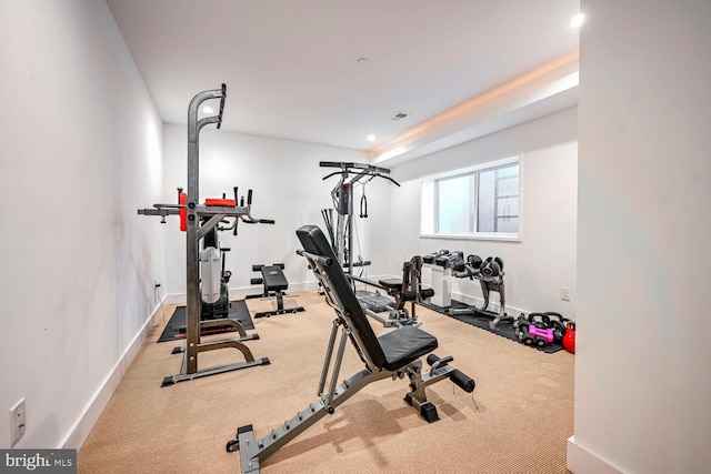 workout area featuring recessed lighting, baseboards, visible vents, and carpet floors