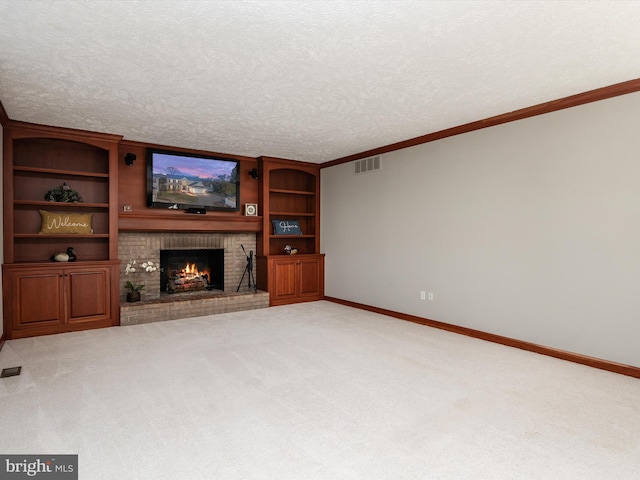 unfurnished living room featuring carpet, a brick fireplace, a textured ceiling, and baseboards