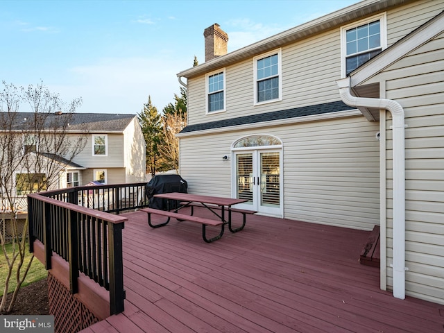 wooden deck with french doors