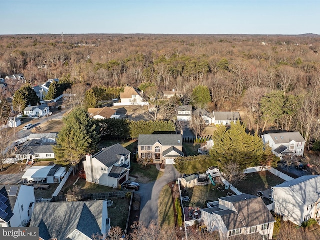 aerial view with a forest view and a residential view