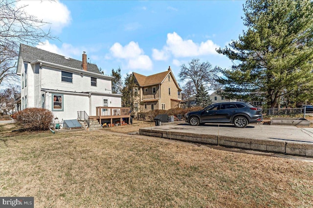 view of yard with a wooden deck