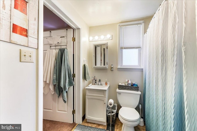 bathroom featuring a sink and toilet