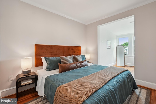 1707 D St SE, Washington, DC 20003 - bedroom featuring wood finished floors, baseboards, and ornamental molding