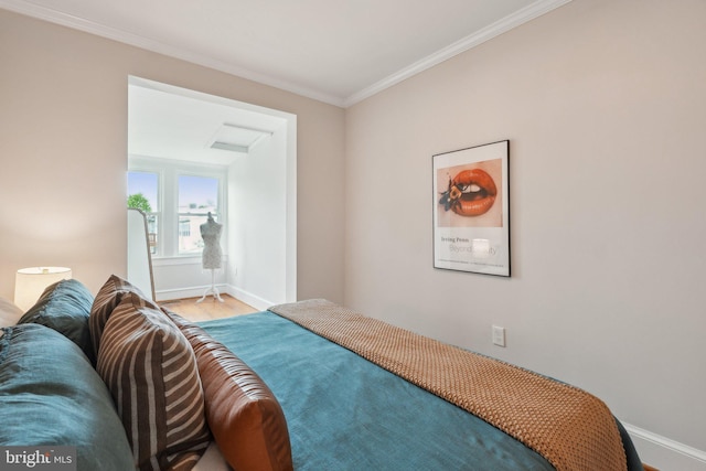 1707 D St SE, Washington, DC 20003 - bedroom featuring baseboards, crown molding, attic access, and wood finished floors