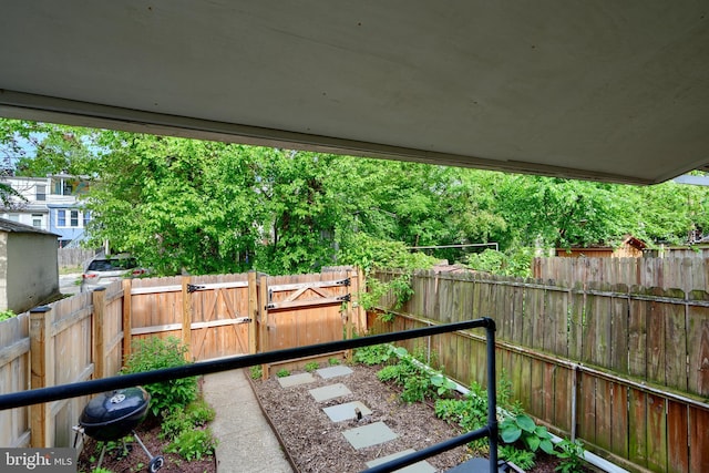 view of patio / terrace with a gate and a fenced backyard