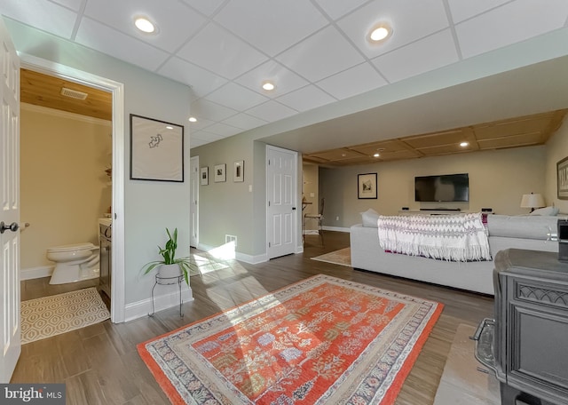 interior space with visible vents, recessed lighting, baseboards, and wood finished floors