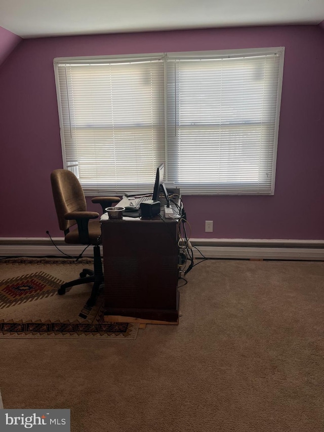 office space with vaulted ceiling, carpet floors, and plenty of natural light