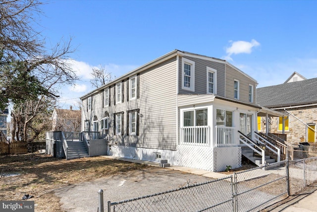 view of front facade with a gate and fence private yard