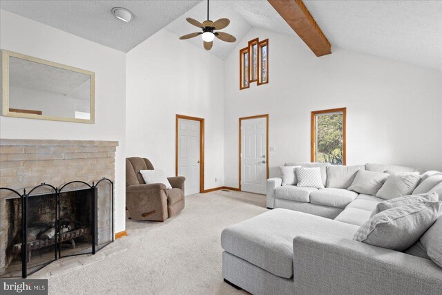 carpeted living area featuring high vaulted ceiling, a fireplace, a textured ceiling, and beamed ceiling