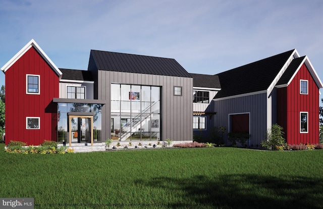 view of front of home featuring a front lawn and board and batten siding