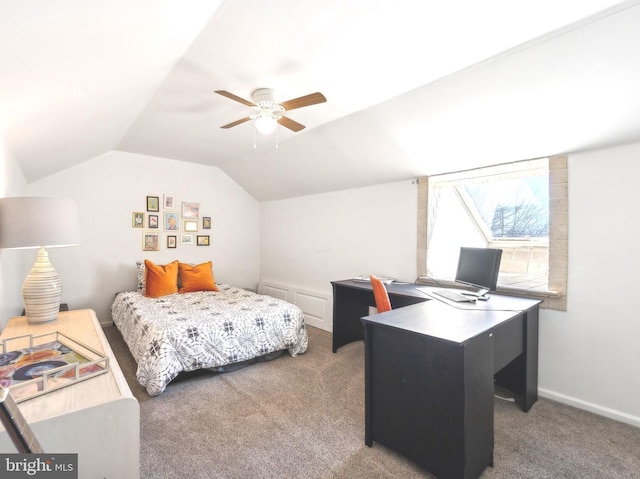 bedroom with ceiling fan, carpet flooring, and vaulted ceiling