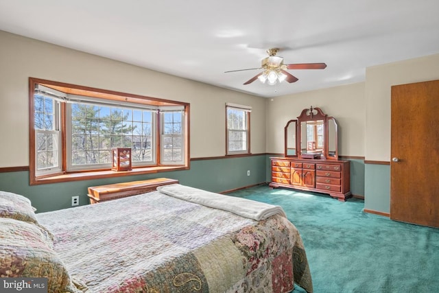 bedroom featuring a ceiling fan, baseboards, and carpet floors