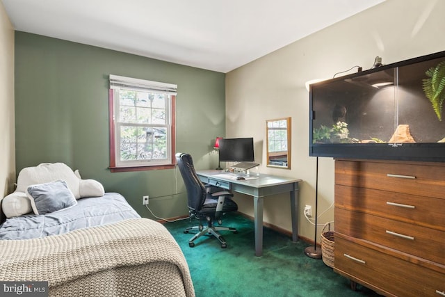 carpeted bedroom with baseboards