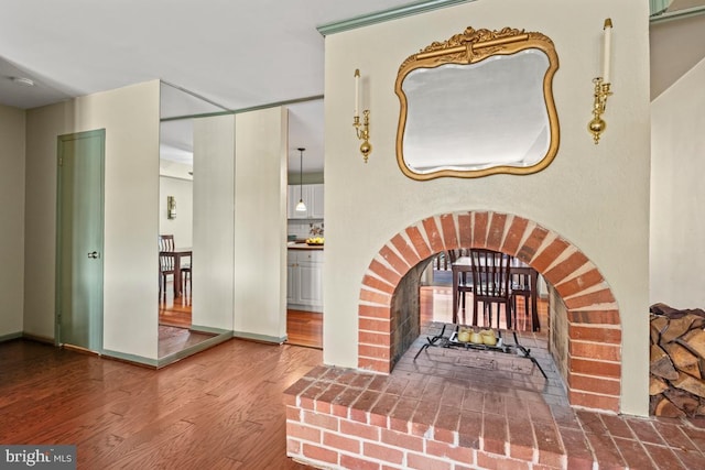 interior space featuring wood finished floors and a fireplace