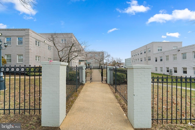 view of gate featuring fence