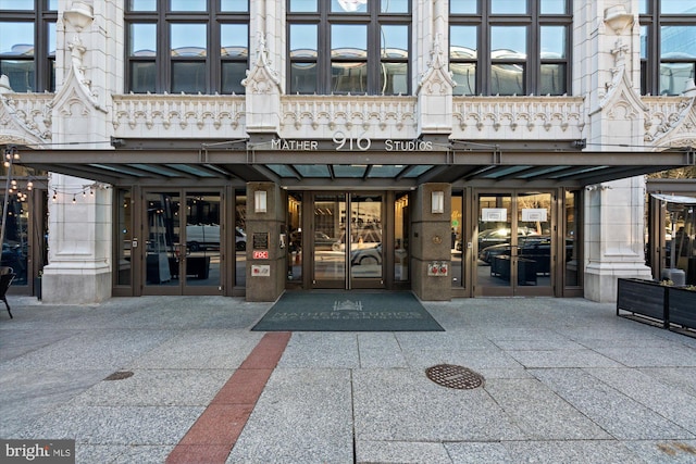 view of exterior entry featuring french doors